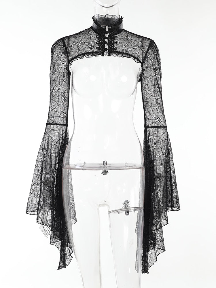 The separate black lace shoulder overlay on a transparent mannequin, showing its open front beneath the high collar.