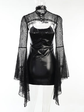 Rear mannequin view of the dress-and-overlay set, showing the exposed upper back between the dress and shoulder lace.