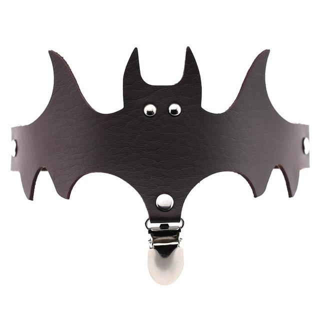 Dark brown bat-shaped garter with a matching narrow band and silver-tone clip below the face.