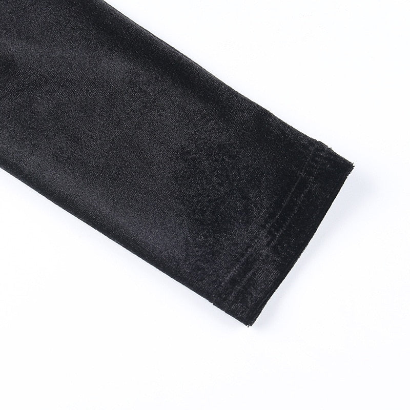 Dark Kitten black hooded sweater and lace skirt separates with a close view of a sleeve cuff.