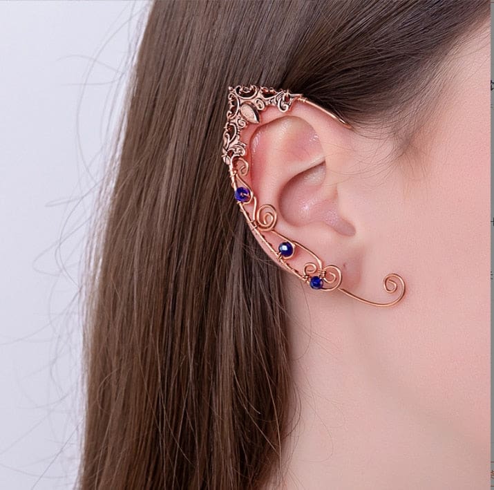 Copper blue gem elf ear cuff worn