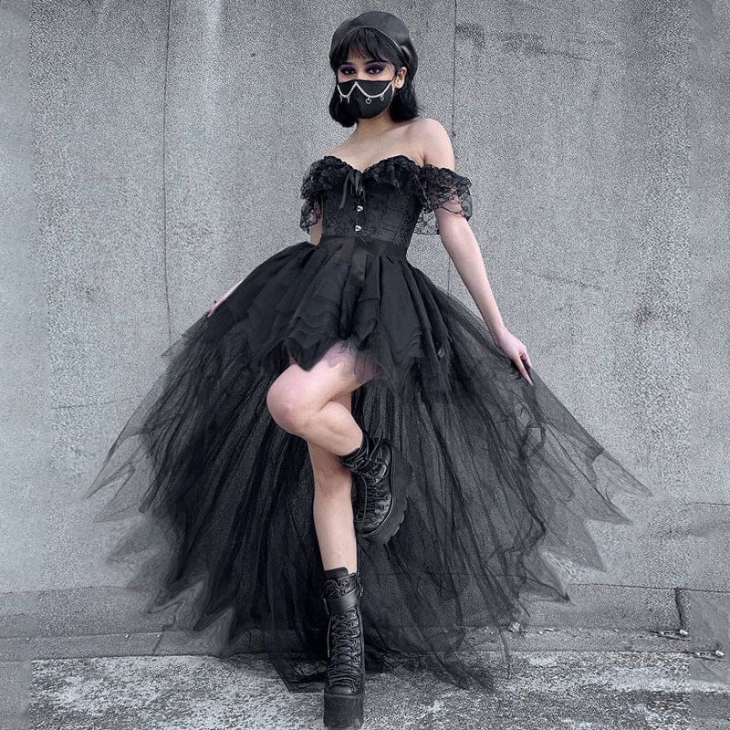 The black layered tutu skirt in a wider raised-leg pose, showing its uneven mesh panels trailing behind the shorter front.