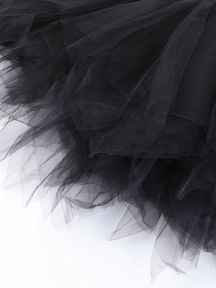 Close-up of the black tutu skirt’s fine mesh layers and pointed, overlapping hem sections.