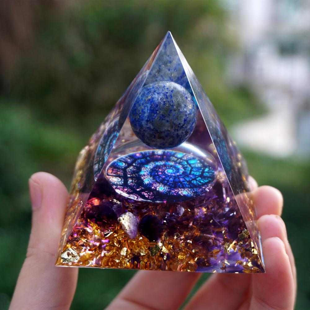 Additional view of Fibonacci-inspired lapis lazuli orgone pyramid with a blue sphere, spiral inlay and purple amethyst layers. An additional close front view shows the blue sphere above purple crystal pieces.