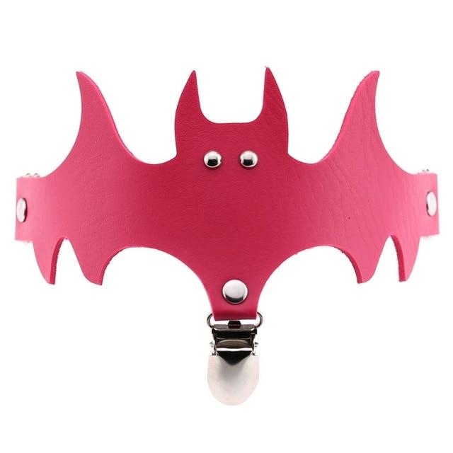 Fuchsia bat-shaped leg garter with a bright matching band and a hanging silver-tone clip.