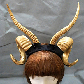 Demon horn headband in Plain Gold, displayed on a wig mannequin.