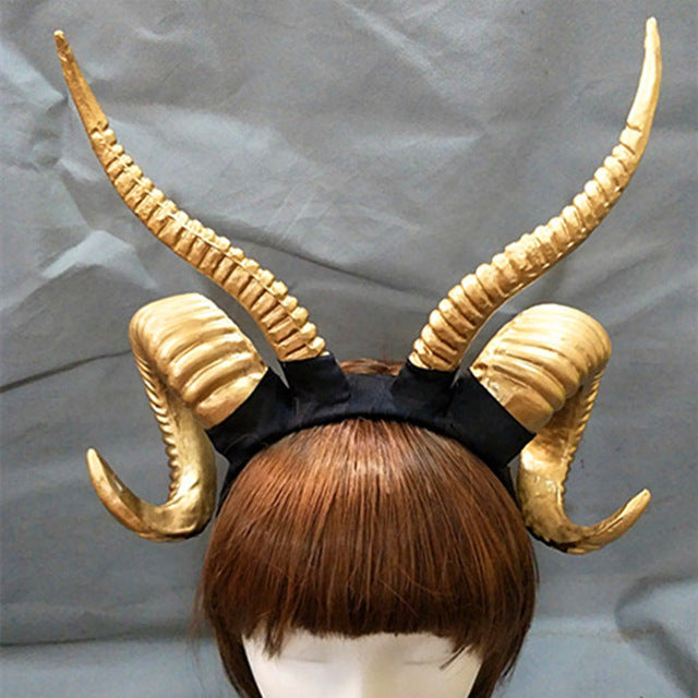 Demon horn headband in Plain Gold, displayed on a wig mannequin.