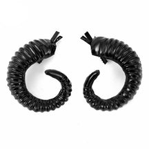 Curled ram horn hair clips with ridged detailing, available in black or white with plain or red rose designs