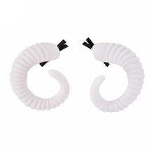 Curled ram horn hair clips with ridged detailing, available in black or white with plain or red rose designs