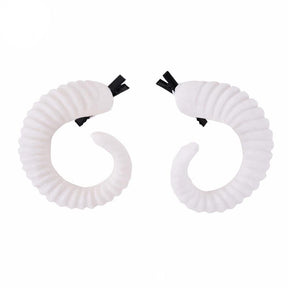 Curled ram horn hair clips with ridged detailing, available in black or white with plain or red rose designs