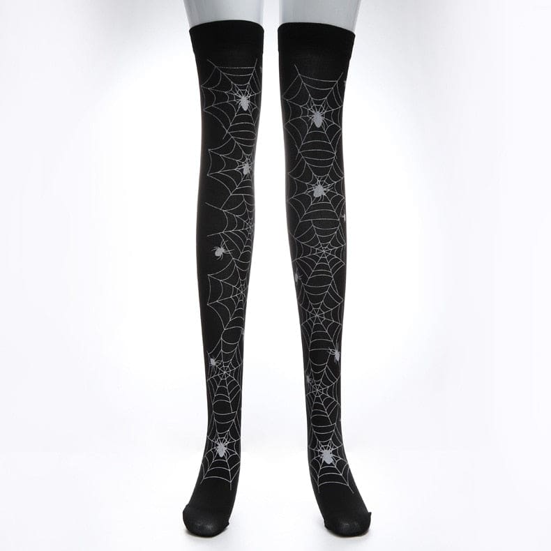 Alternate isolated view of black thigh-high stockings with pale web patterns.
