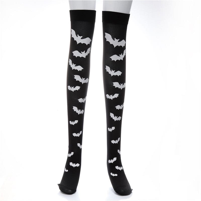 Alternate isolated view of black thigh-high stockings covered in small white bats.