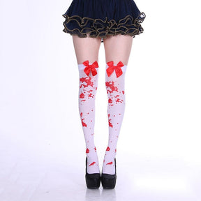 White thigh-high stockings with a red splatter print and large red bows.