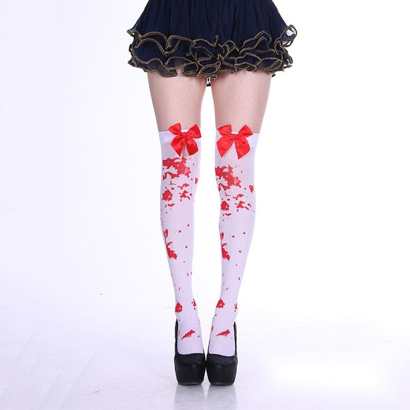 White thigh-high stockings with a red splatter print and large red bows.