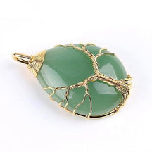 Green aventurine pendant with gold-tone wire branches, a twisted trunk and a wrapped upper bail.