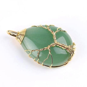 Green aventurine pendant with gold-tone wire branches, a twisted trunk and a wrapped upper bail.