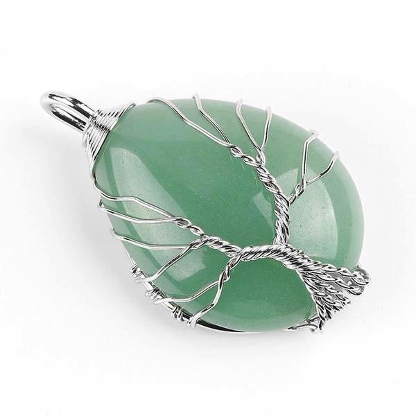 Green aventurine teardrop pendant with a silver-tone wire tree spreading across its polished face.
