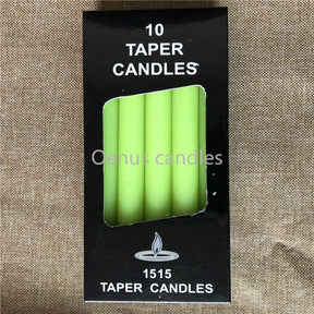 Green slender ritual candles displayed with a box, showing the rich green colour and straight sides.