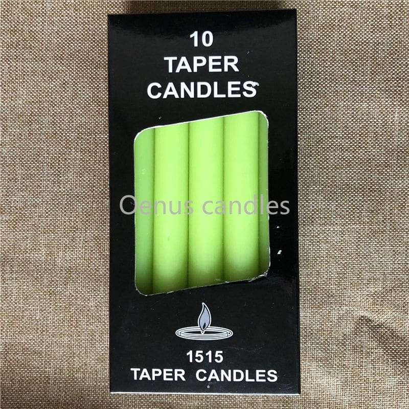 Green slender ritual candles displayed with a box, showing the rich green colour and straight sides.