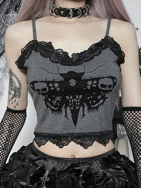 Front view of the grey moth-print tank top, with thin shoulder straps and scalloped black lace at the neckline and cropped hem. Black fishnet sleeves frame the graphic.