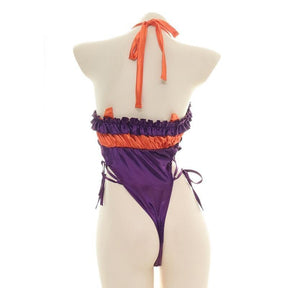 Orange and purple Halloween bodysuit with ruffled trim, a bat neckline accent, halter ties, and lace-up sides