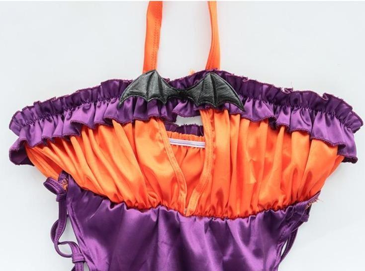 Orange and purple Halloween bodysuit with ruffled trim, a bat neckline accent, halter ties, and lace-up sides
