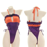 Orange and purple Halloween bodysuit with ruffled trim, a bat neckline accent, halter ties, and lace-up sides