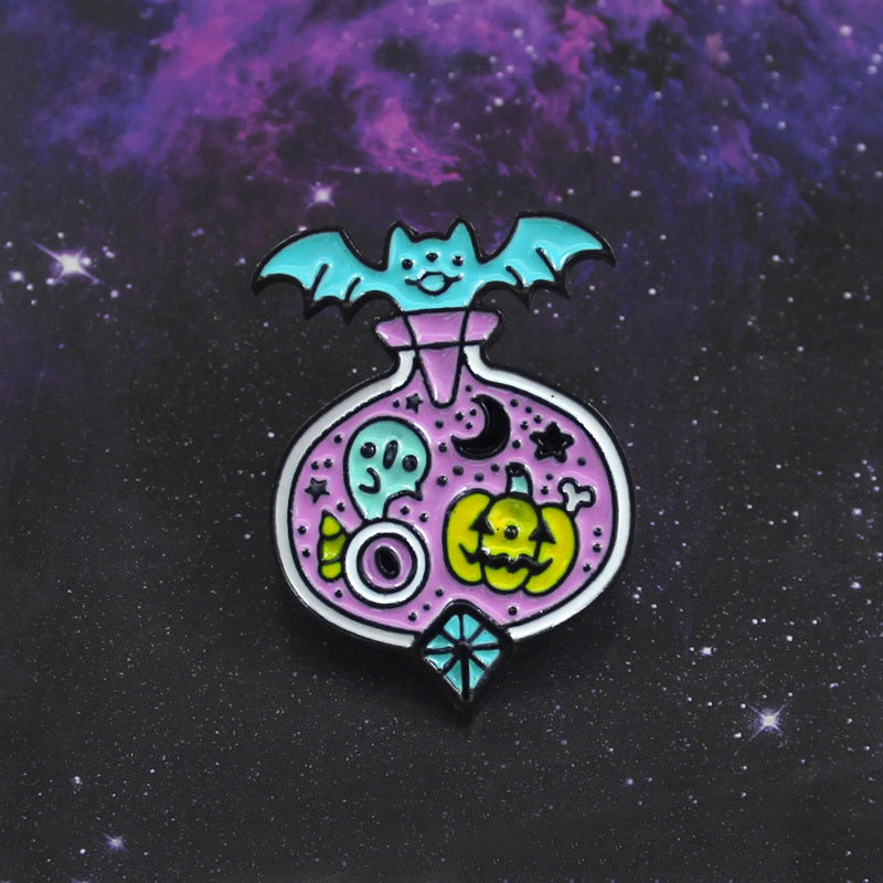 Pastel Halloween potion-bottle pin against a purple galaxy background, with a turquoise bat across the top and a diamond-shaped turquoise accent at the bottom.
