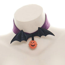 Purple Bat Wings choker on a white display bust, showing the plain purple band, black wing centerpiece and hanging jack-o-lantern charm.