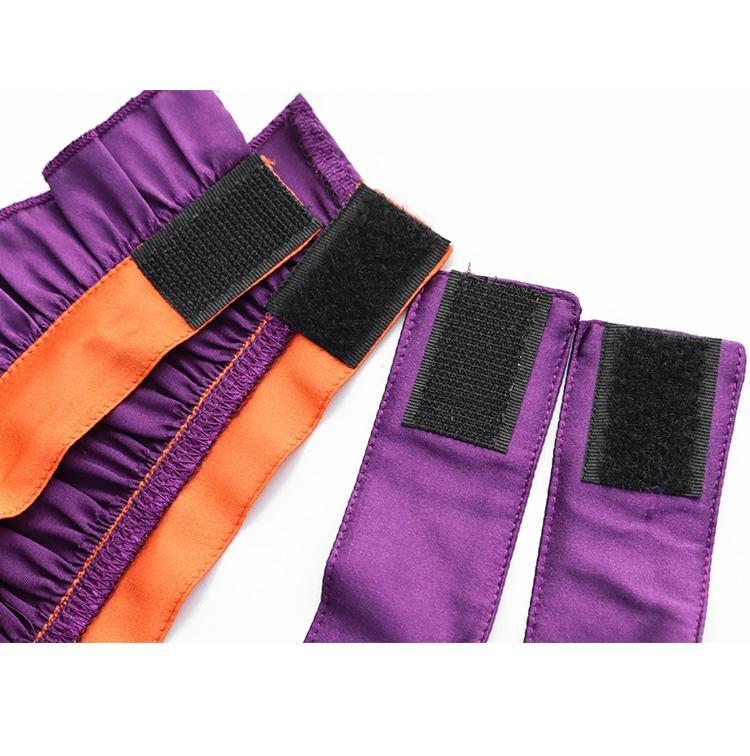 Back fastening detail of the Halloween chokers, showing black hook-and-loop patches on the orange and purple fabric bands.