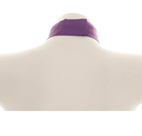 Rear view of the plain purple Halloween choker band on a white display bust, showing the overlapping fastening at the back of the neck.
