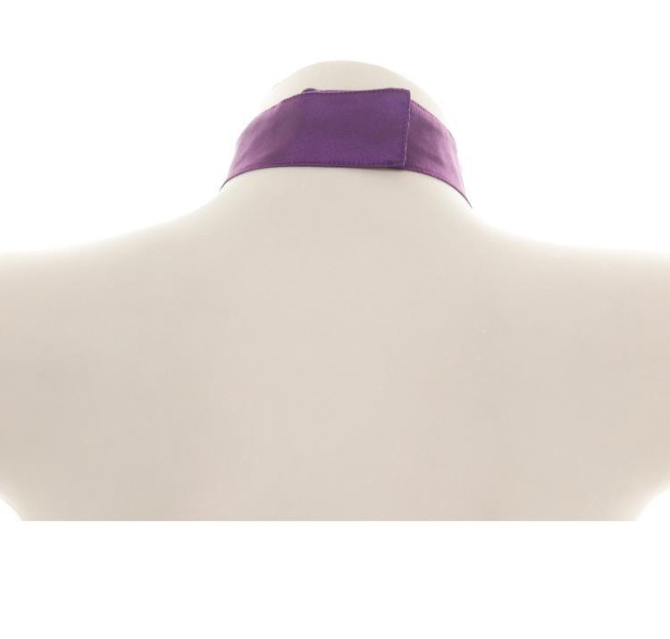 Rear view of the plain purple Halloween choker band on a white display bust, showing the overlapping fastening at the back of the neck.