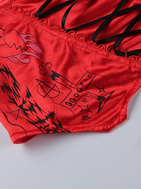 Close-up of the lower red bustier panel with black symbols, curved stitching and ribbon lacing along one edge.