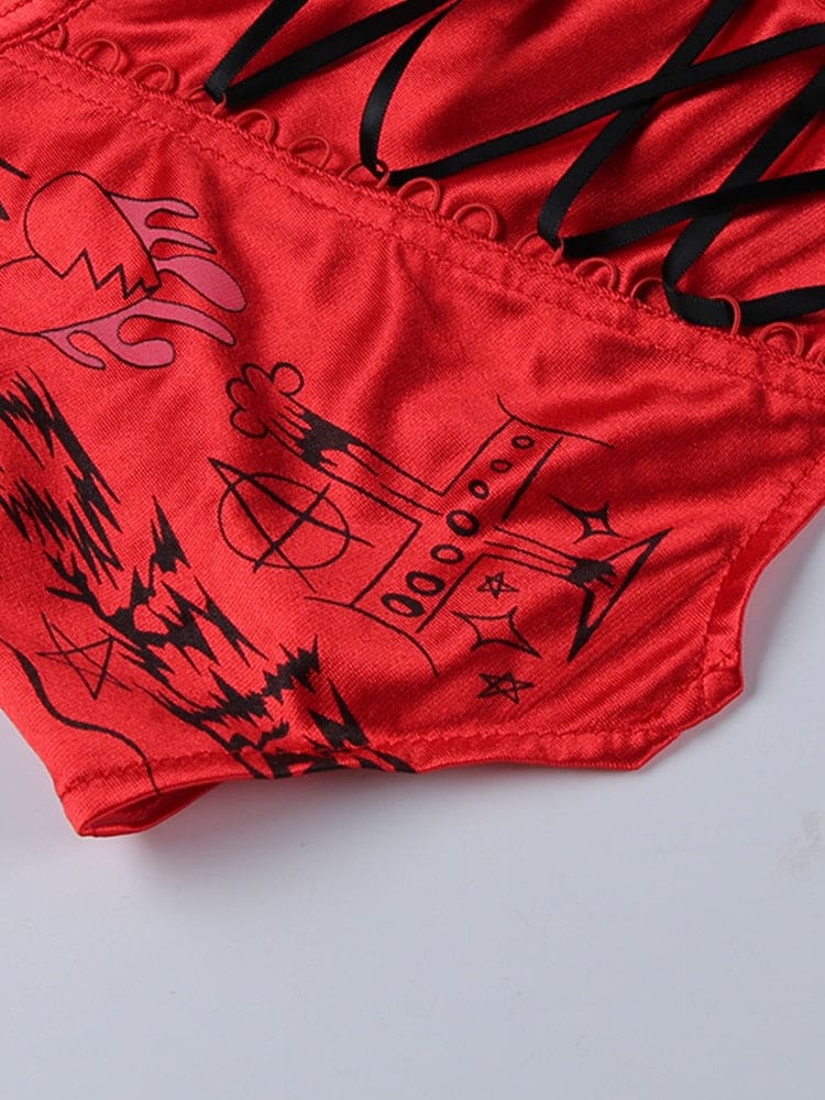 Close-up of the lower red bustier panel with black symbols, curved stitching and ribbon lacing along one edge.