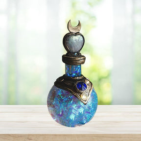 Blue crescent bottle window display