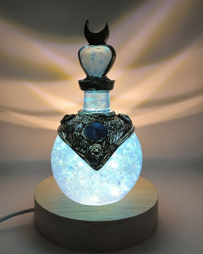 Blue illuminated bottle closer view