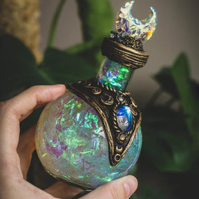 Iridescent crescent-top bottle close-up