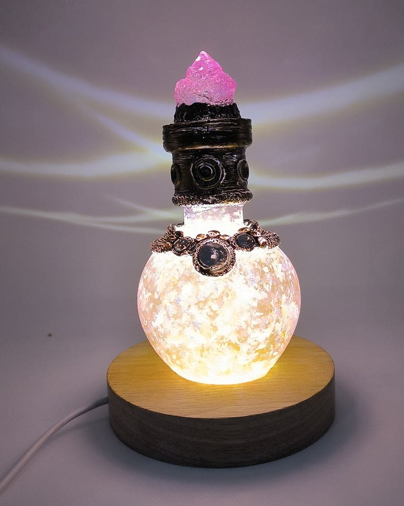 Pink illuminated bottle wider view