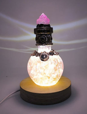 Pink bottle with light base front