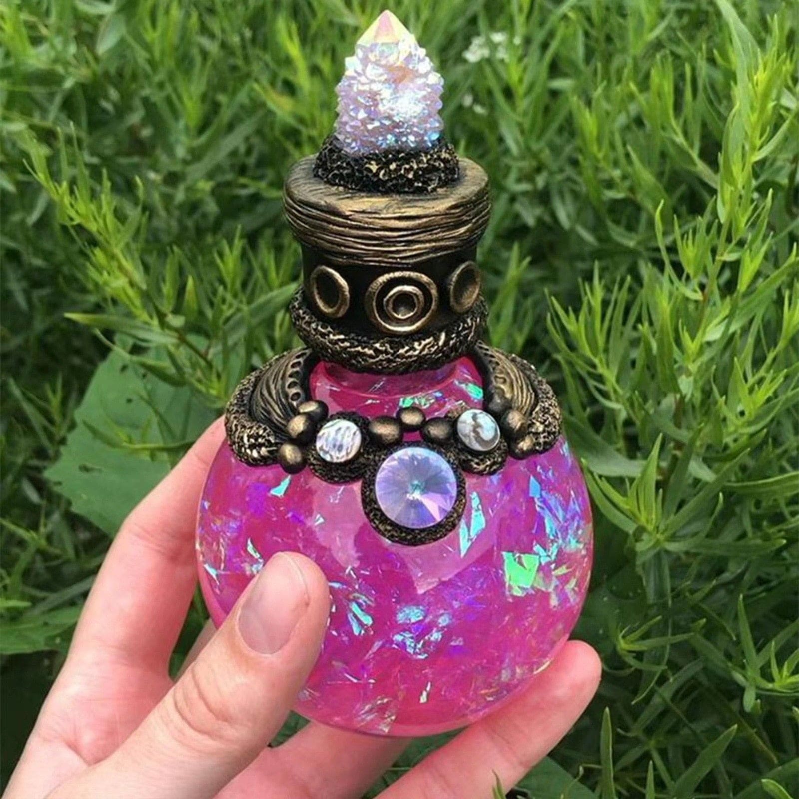 Pink pointed-top bottle front close-up