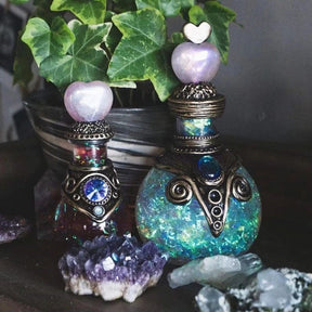 Decorative iridescent bottle pair with purple hearts