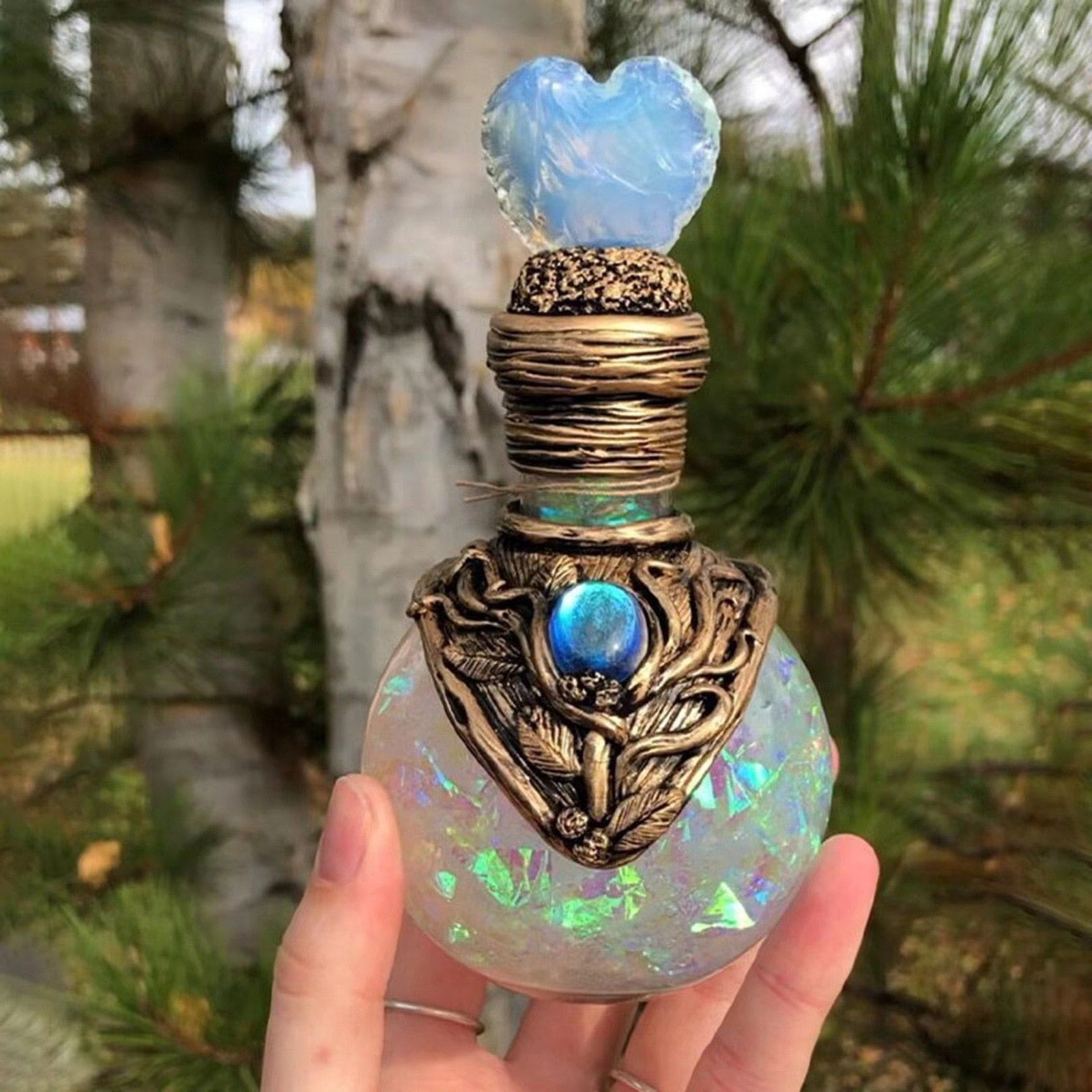 White heart-top bottle front close-up