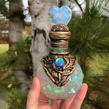 White heart-top bottle front close-up