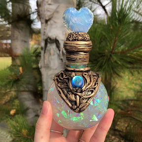 White heart-top bottle front close-up
