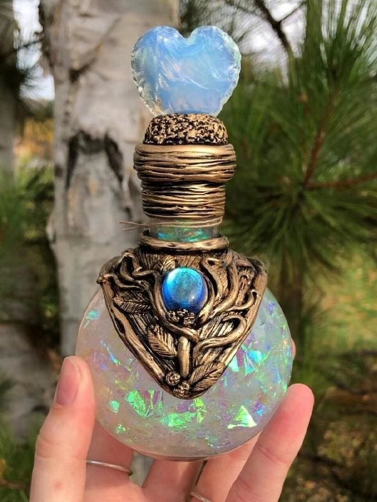 White iridescent heart bottle front portrait