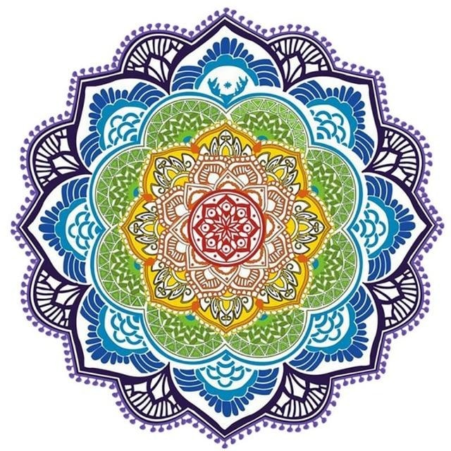 Full navy-and-teal mandala flower throw with a red centre, pale patterned petals and a dotted scalloped edge.