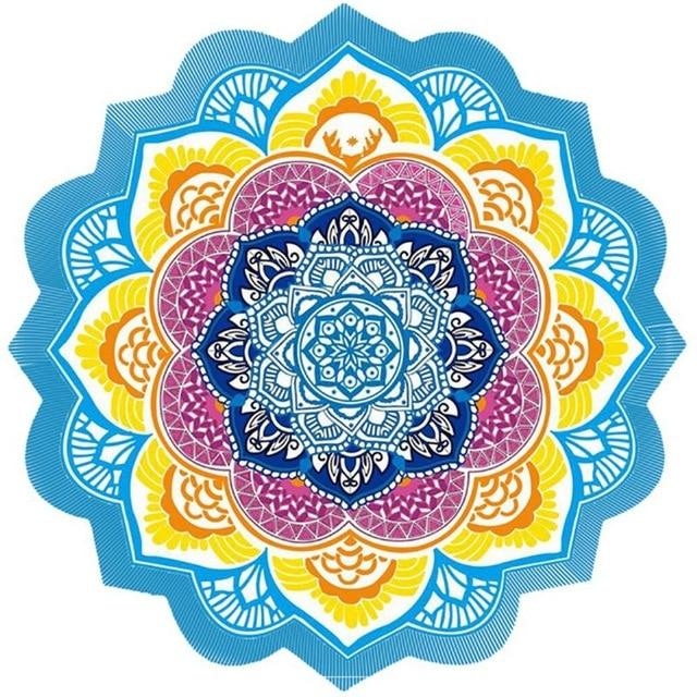 Full flower-shaped teal mandala throw with yellow, white and pink decorative rings and rounded printed scallops.