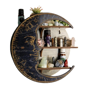 Black moon face shelf filled with crystals