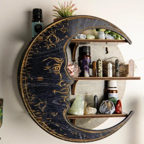 Black moon shelf styled on a wall