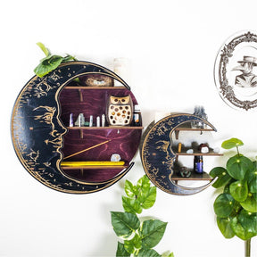 Two moon shelves displayed with plants